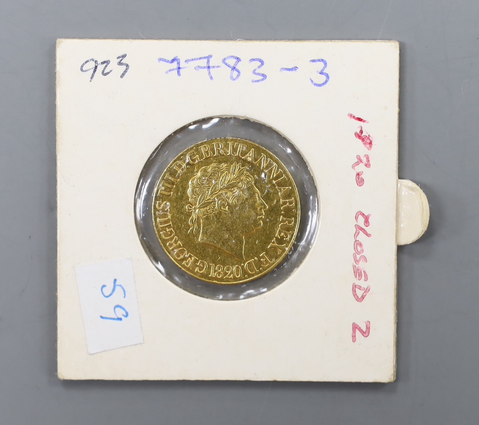A George III gold sovereign 1820 (closed 2), VF or better (exmount).
